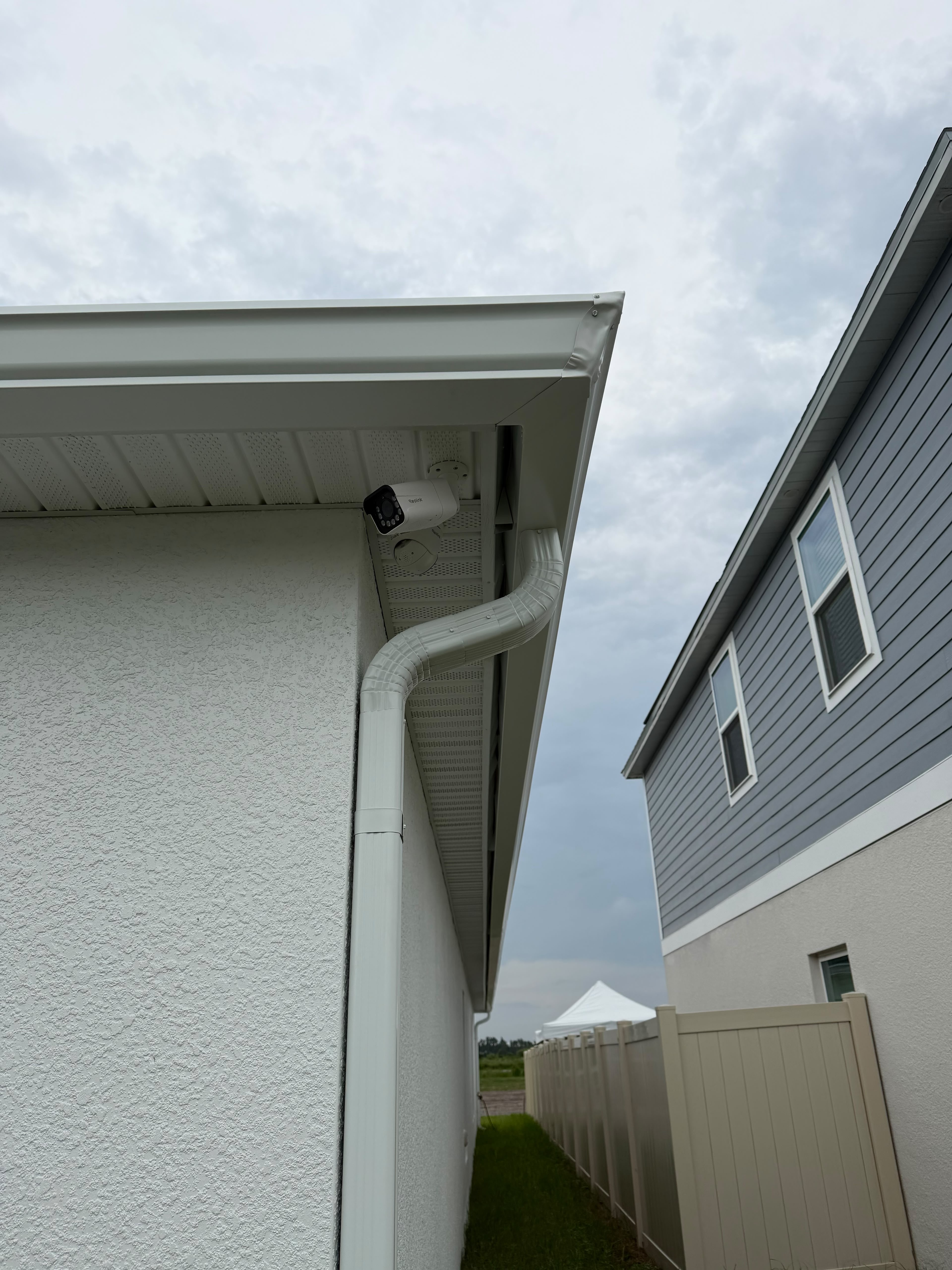 Oversized downspout installed at the corner of a Florida home