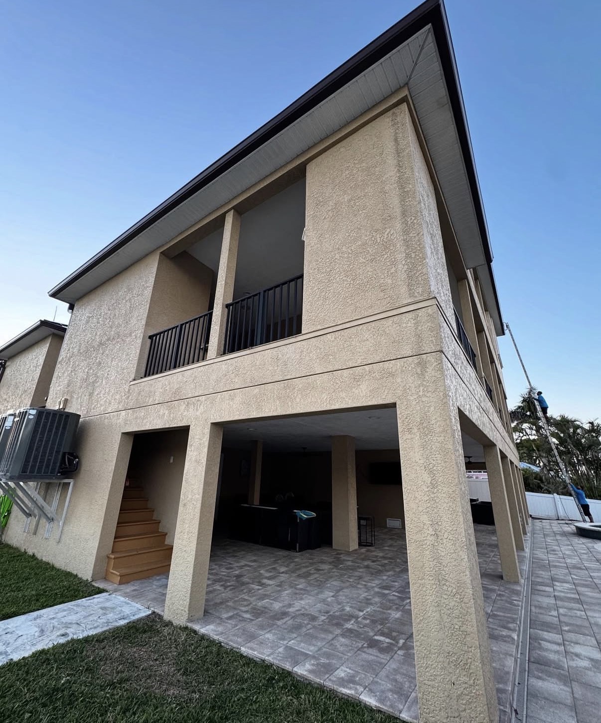 Elevated Florida residence with complex roofline